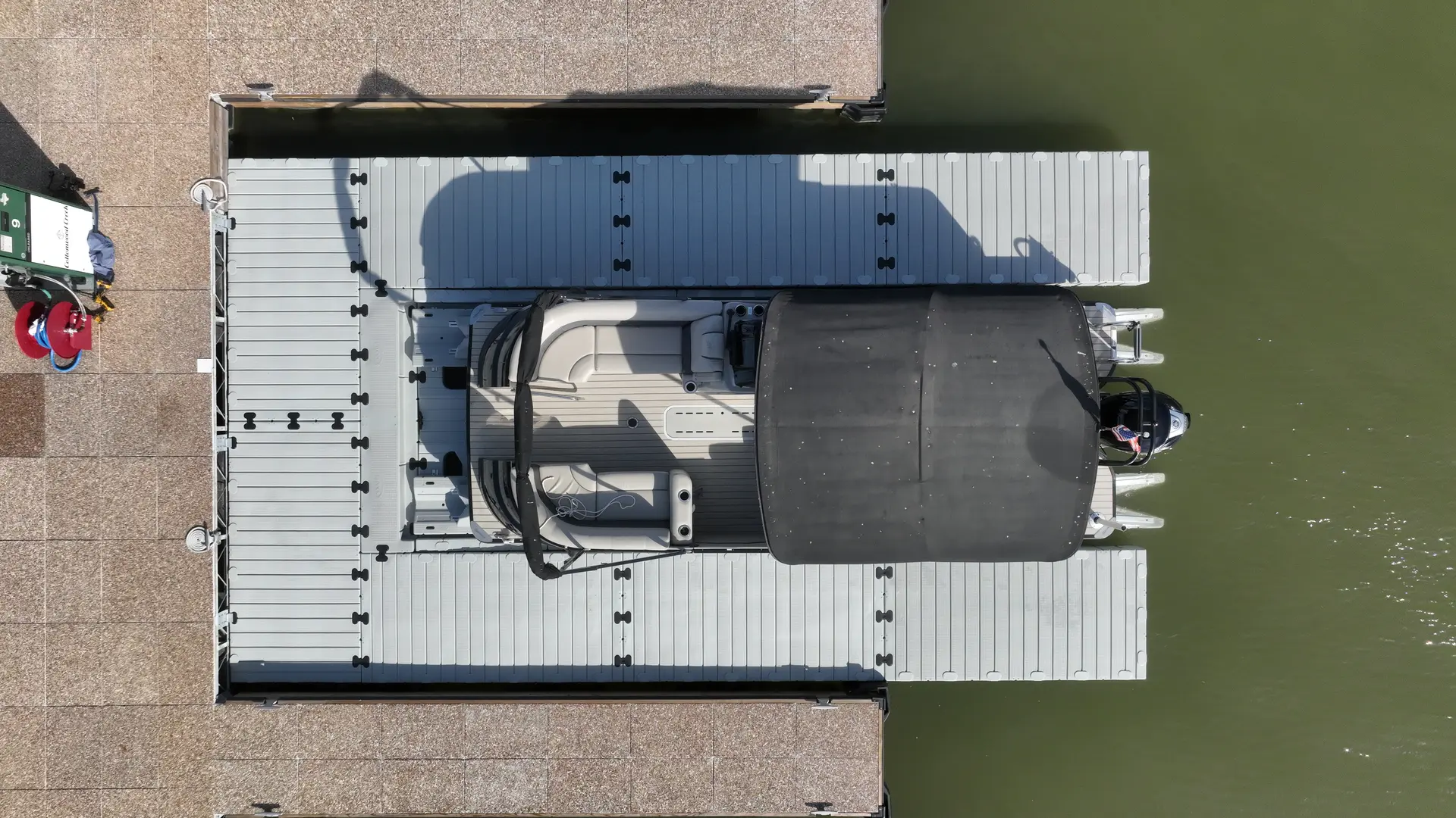 Boat parked on an EZ Dock floating boat port
