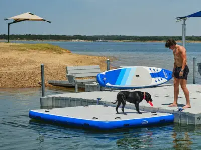 EZ Dock inflatable 10' x 8' rectangle raft with a dog on board