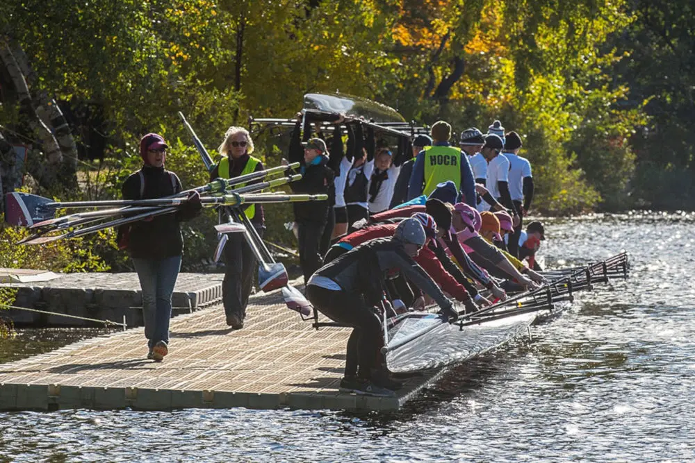 Paddler launching from an EZ Dock low-profile kayak launch